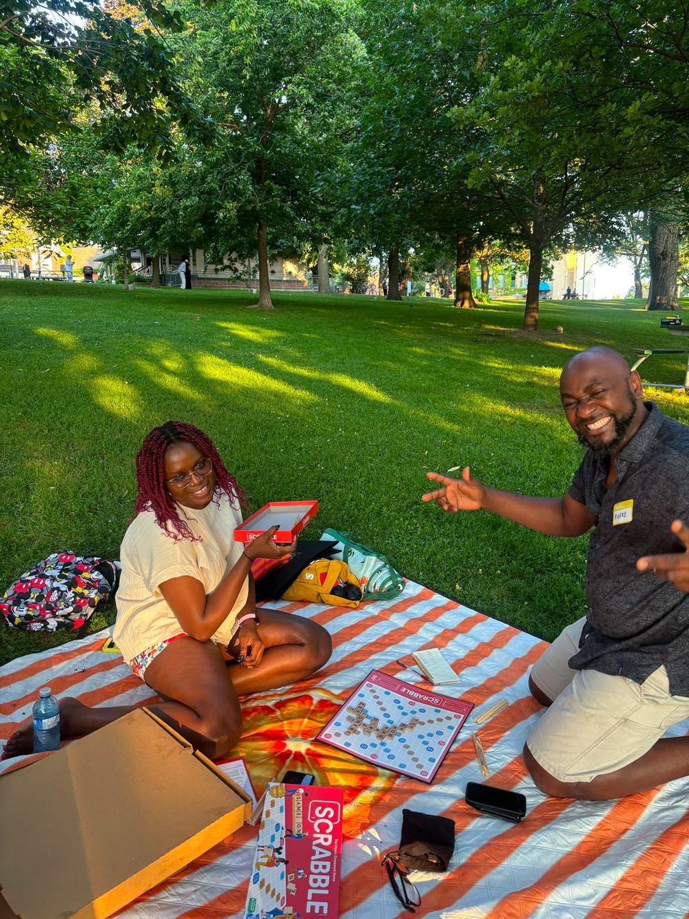 Games on the grass — Scrabble players enjoying the afternoon